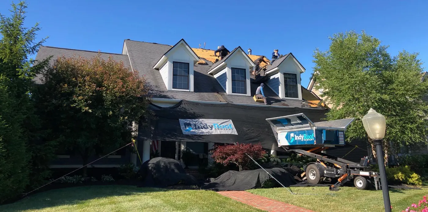 Tarping and dry-in on a Connersville commercial roof